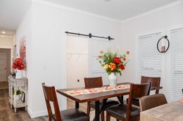 The 1439 CAROLINA "MAGNOLIA" Dining Area. This Manufactured Mobile Home features 3 bedrooms and 2 baths.