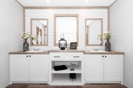 The FARM HOUSE BREEZE 56 Master Bathroom. This Manufactured Mobile Home features 3 bedrooms and 2 baths.