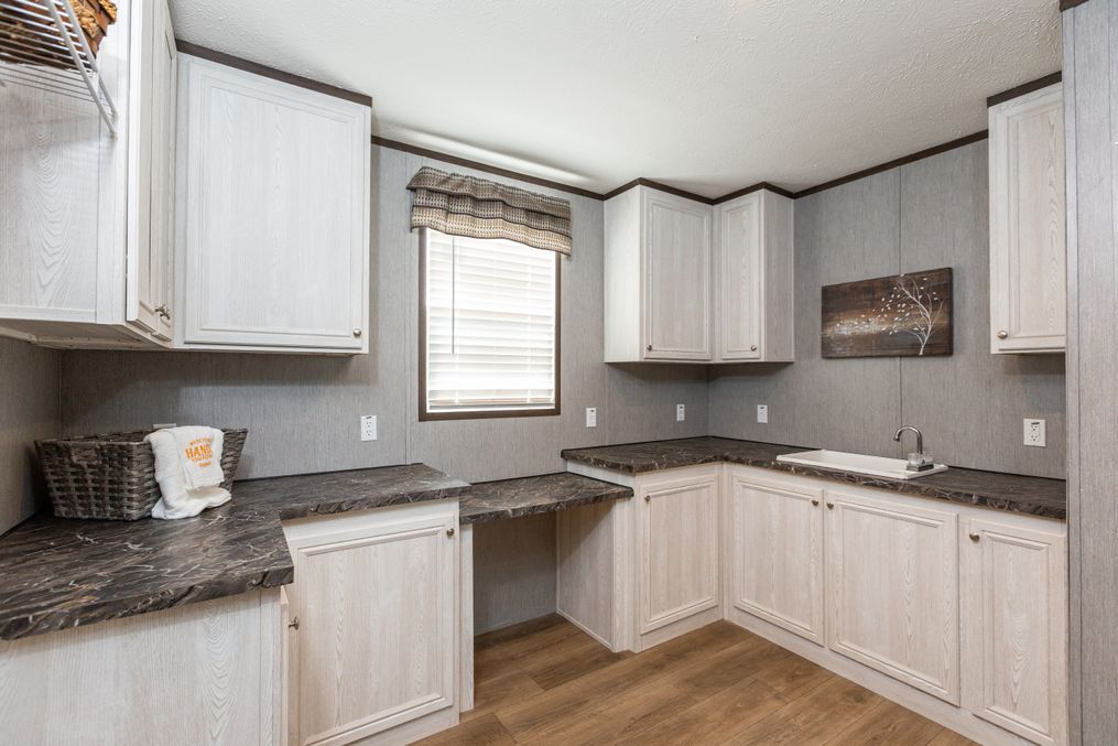 The THE HAMPTON BAY Utility Room. This Manufactured Mobile Home features 3 bedrooms and 2 baths.