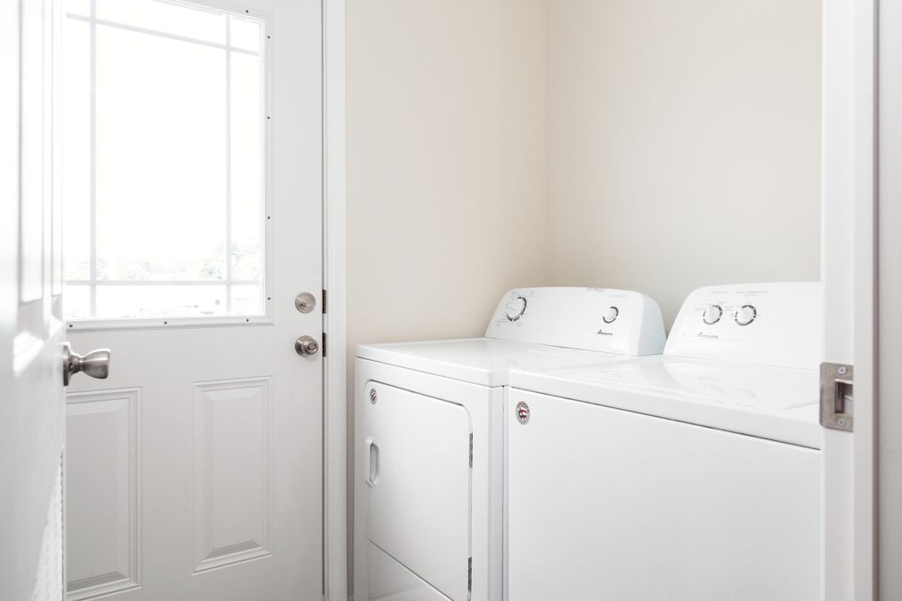 The CLASSIC 56G Utility Room. This Manufactured Mobile Home features 3 bedrooms and 2 baths.