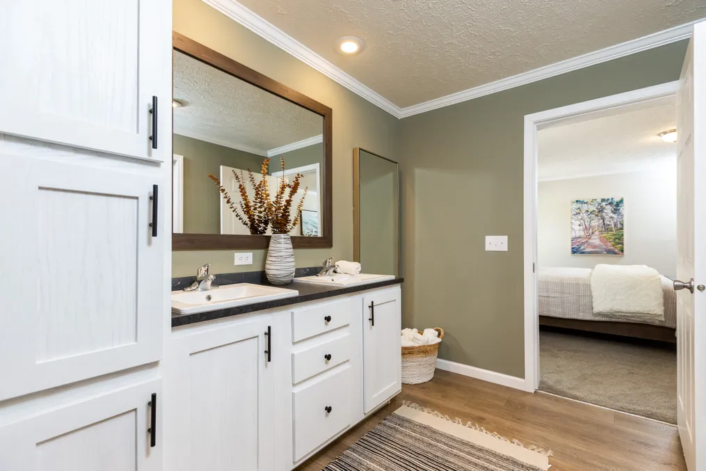 The KEENELAND Primary Bathroom. This Manufactured Mobile Home features 3 bedrooms and 2 baths.