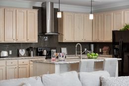 The NORMANDY Kitchen. This Manufactured Mobile Home features 3 bedrooms and 2 baths.