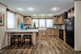 The THE SOCIAL 72 Kitchen. This Manufactured Mobile Home features 3 bedrooms and 2 baths.