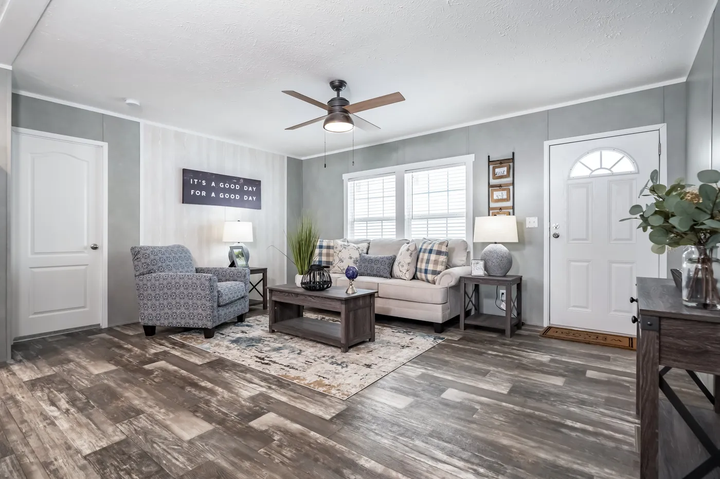 The ULTRA BREEZE 52 Living Room. This Manufactured Mobile Home features 3 bedrooms and 2 baths.
