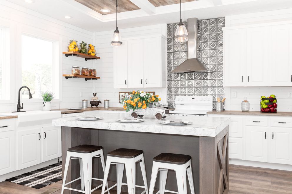 The 1440 CAROLINA 4BR BELLE Kitchen. This Manufactured Mobile Home features 4 bedrooms and 2 baths.