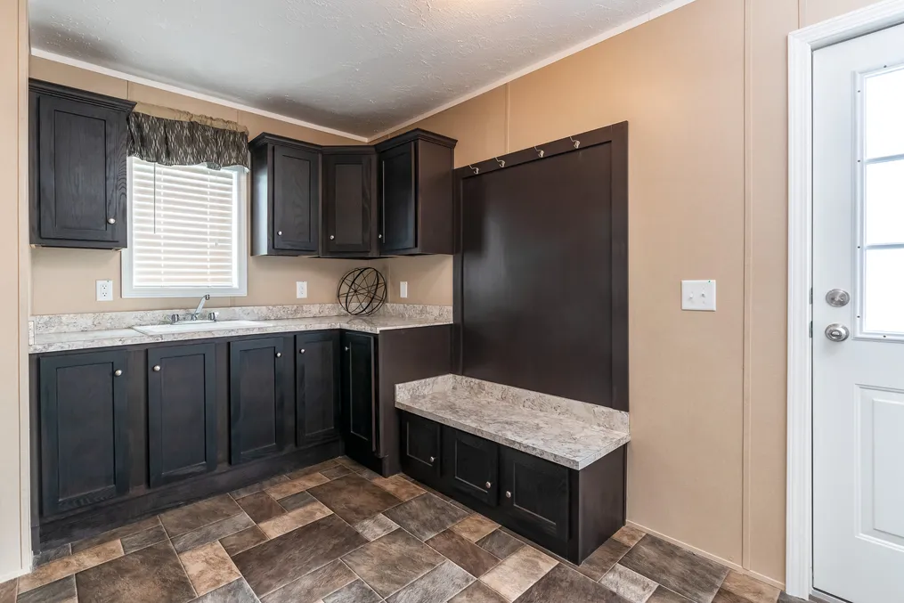 The 5604 ENTERPRISE 4 6428 Utility Room. This Manufactured Mobile Home features 3 bedrooms and 2 baths.