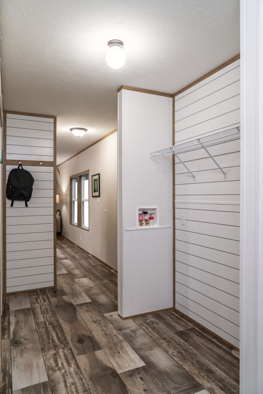 The BLAZER EXTREME 1666 F Utility Room. This Manufactured Mobile Home features 3 bedrooms and 2 baths.