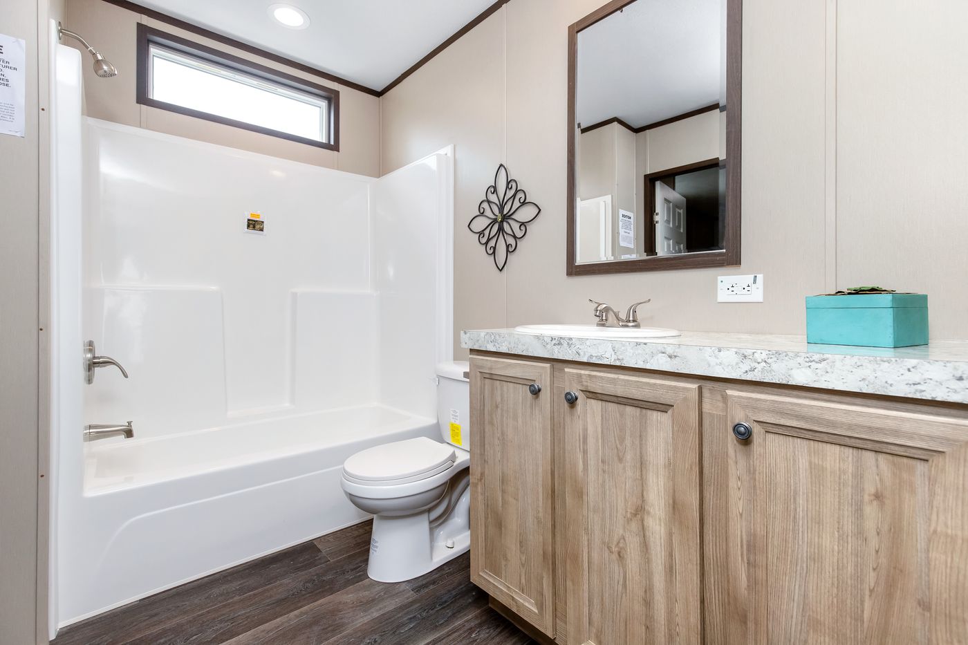 The PT 78 Guest Bathroom. This Manufactured Mobile Home features 3 bedrooms and 2 baths.