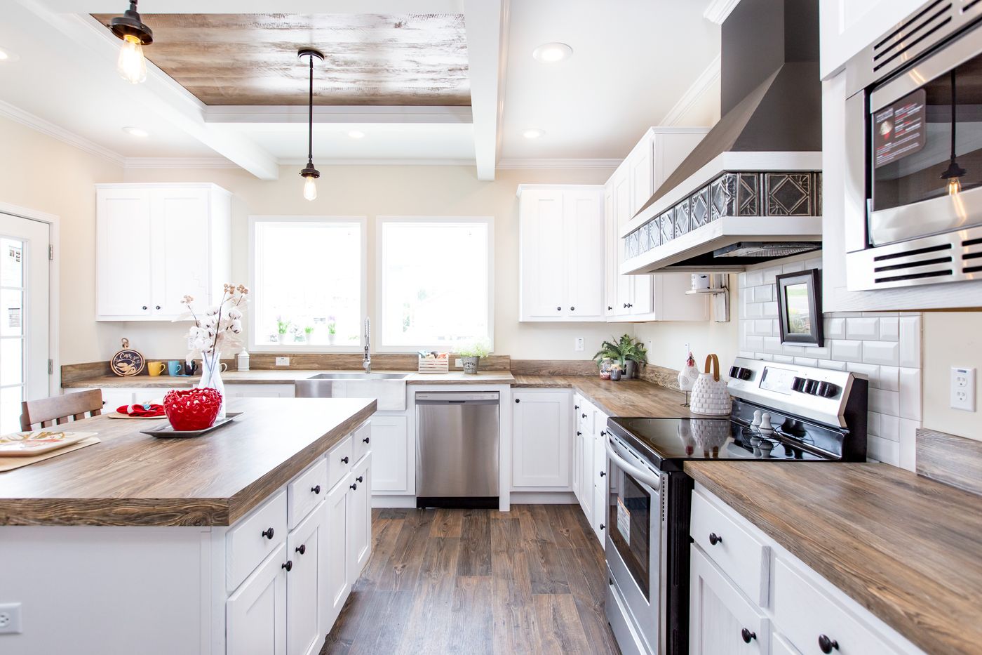 The SOUTHERN CHARM Kitchen. This Manufactured Mobile Home features 3 bedrooms and 2 baths.