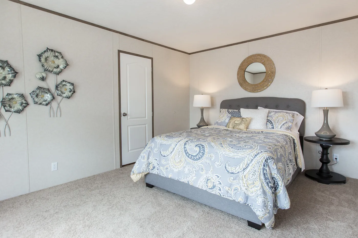 The THE BREEZE Primary Bedroom. This Manufactured Mobile Home features 3 bedrooms and 2 baths.