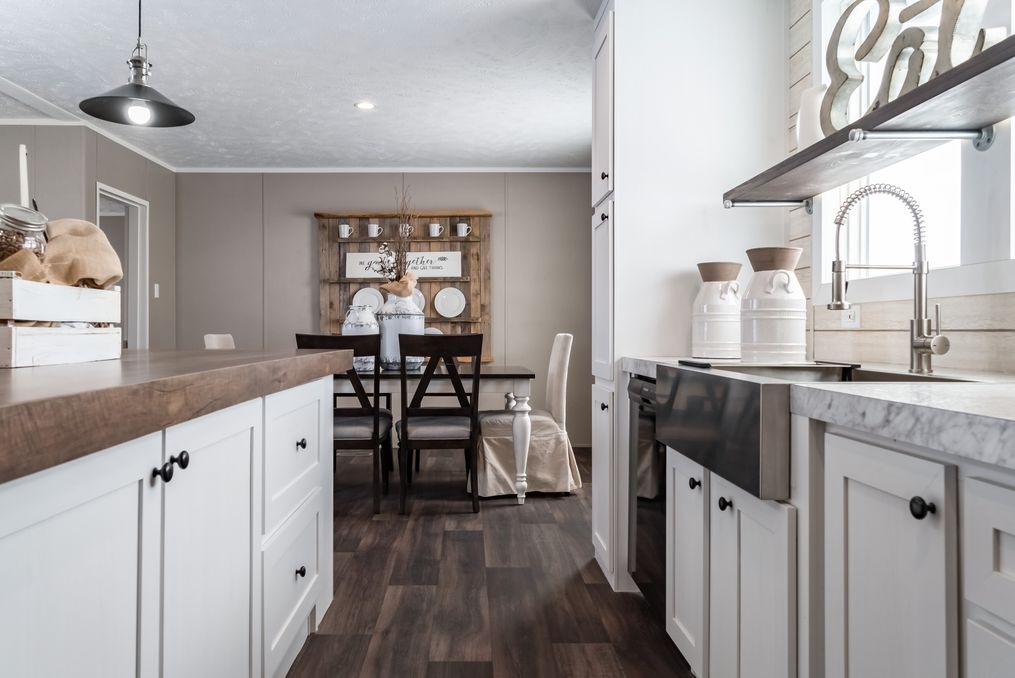 The THE RESERVE 60 Kitchen. This Manufactured Mobile Home features 3 bedrooms and 2 baths.