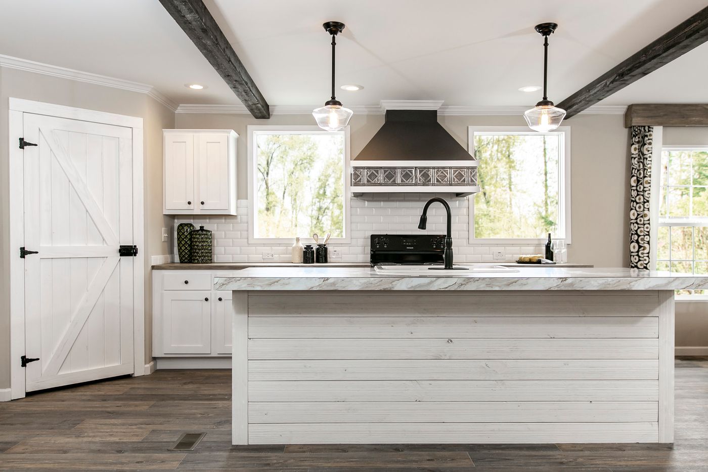 The FREEDOM FARM HOUSE  32X60 Kitchen. This Manufactured Mobile Home features 3 bedrooms and 2 baths.