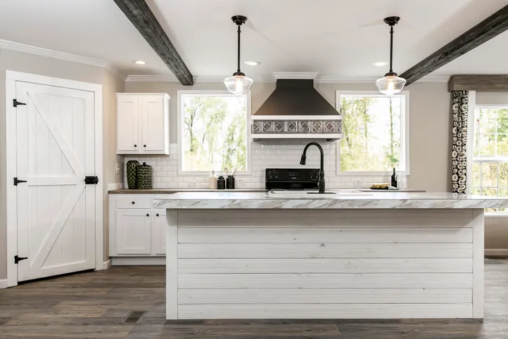The FREEDOM FARM HOUSE  32X60 Kitchen. This Manufactured Mobile Home features 3 bedrooms and 2 baths.