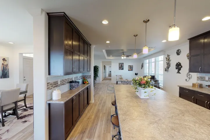 The SUM3068A Kitchen. This Manufactured Mobile Home features 3 bedrooms and 2 baths.