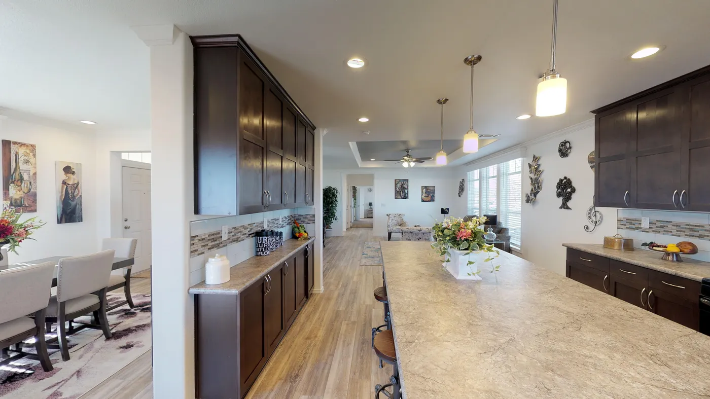 The SUM3068A Kitchen. This Manufactured Mobile Home features 3 bedrooms and 2 baths.
