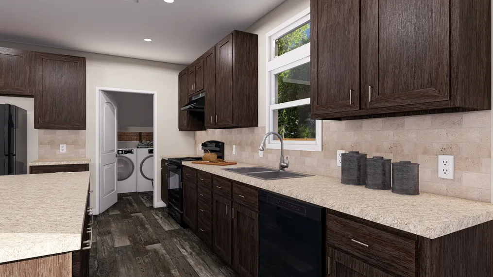 The ANNIVERSARY 3.0 Kitchen. This Manufactured Mobile Home features 3 bedrooms and 2 baths.