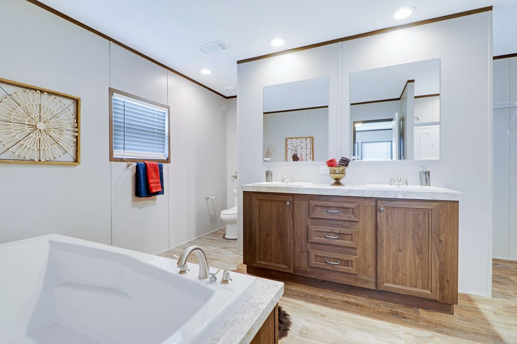 The THE ANNIVERSARY 2.1 Primary Bathroom. This Manufactured Mobile Home features 3 bedrooms and 2 baths.