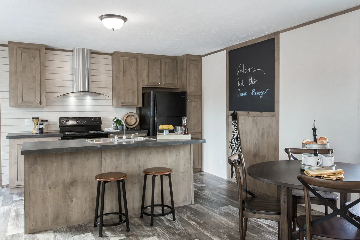 The THE BREEZE Kitchen. This Manufactured Mobile Home features 3 bedrooms and 2 baths.