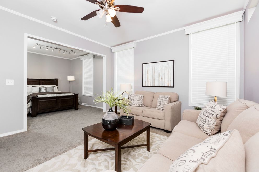 The ENCHANTMENT 3070A Primary Bedroom. This Manufactured Mobile Home features 3 bedrooms and 2 baths.