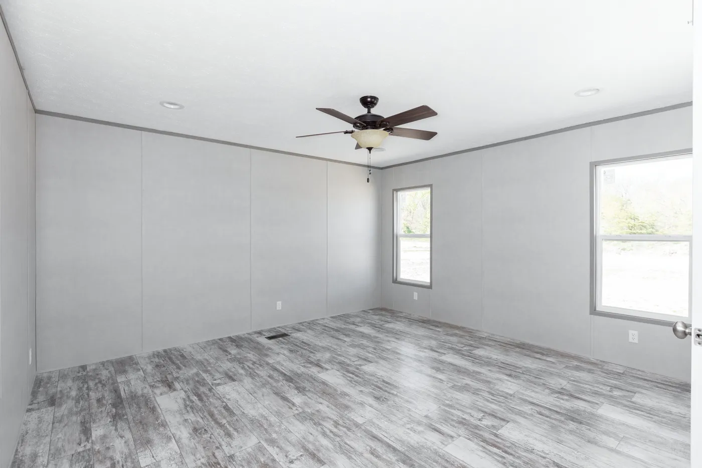 The DIAMOND Primary Bedroom. This Manufactured Mobile Home features 3 bedrooms and 2 baths.