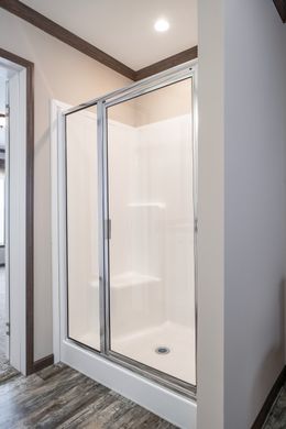 The THE STARK Primary Bathroom. This Manufactured Mobile Home features 3 bedrooms and 2 baths.