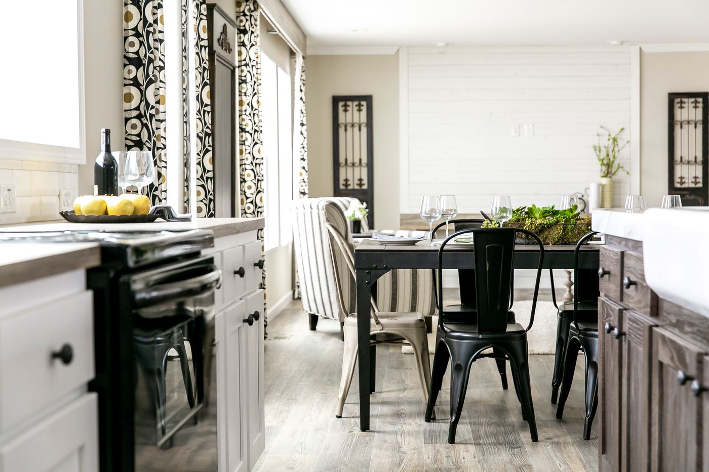 The FREEDOM FARM HOUSE  32X60 Dining Area. This Manufactured Mobile Home features 3 bedrooms and 2 baths.