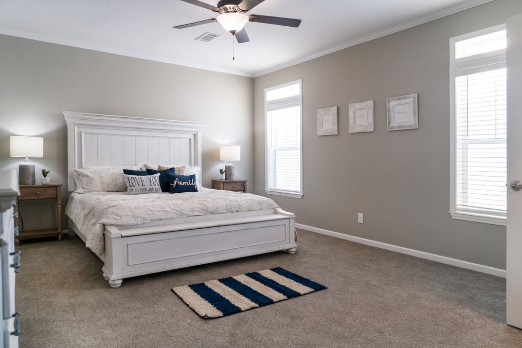 The THE HUXTON Master Bedroom. This Manufactured Mobile Home features 4 bedrooms and 3 baths.