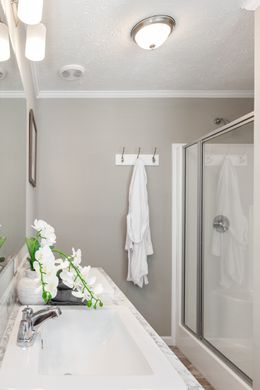 The 777 "COOL BREEZE" 7616 Master Bathroom. This Manufactured Mobile Home features 3 bedrooms and 2 baths.