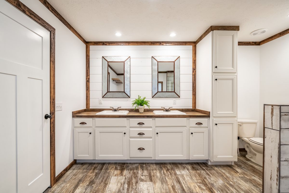 The THE AVALYN Primary Bathroom. This Manufactured Mobile Home features 3 bedrooms and 2 baths.