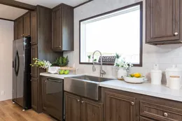 The THE HAMPTON BAY Kitchen. This Manufactured Mobile Home features 3 bedrooms and 2 baths.