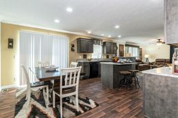 The WINCHESTER FLEX Dining Area. This Manufactured Mobile Home features 4 bedrooms and 2 baths.