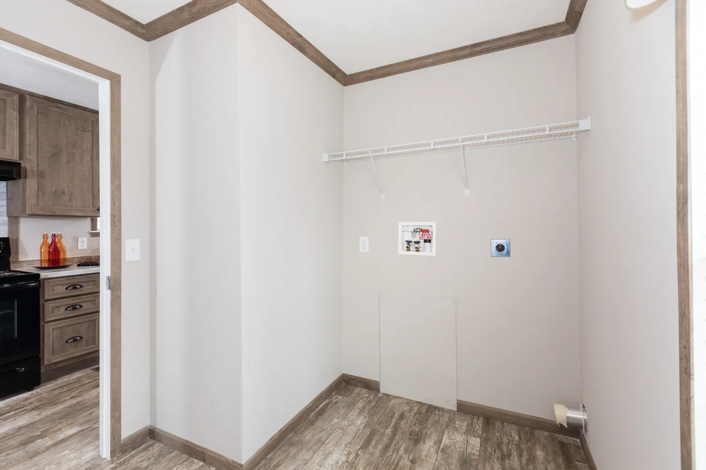 The THE MARION Utility Room. This Manufactured Mobile Home features 3 bedrooms and 2 baths.