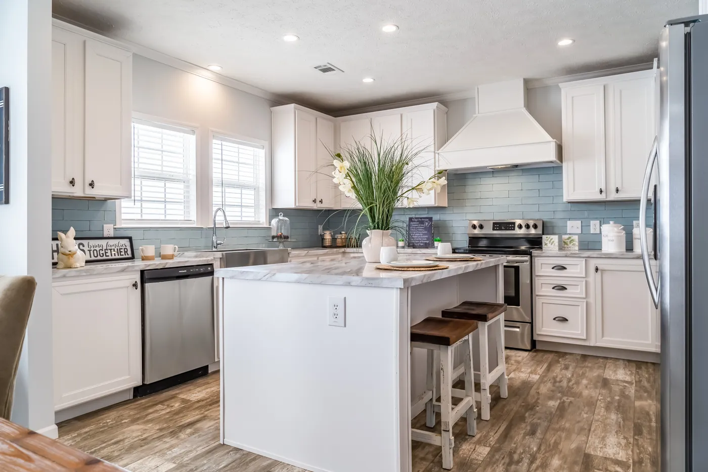 The THE INGRAM Kitchen. This Manufactured Mobile Home features 3 bedrooms and 2 baths.