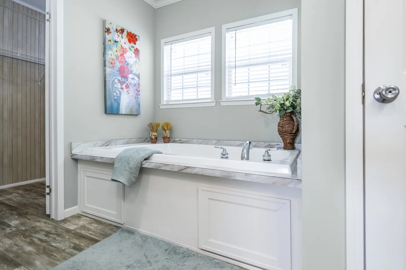 The THE INGRAM Primary Bathroom. This Manufactured Mobile Home features 3 bedrooms and 2 baths.