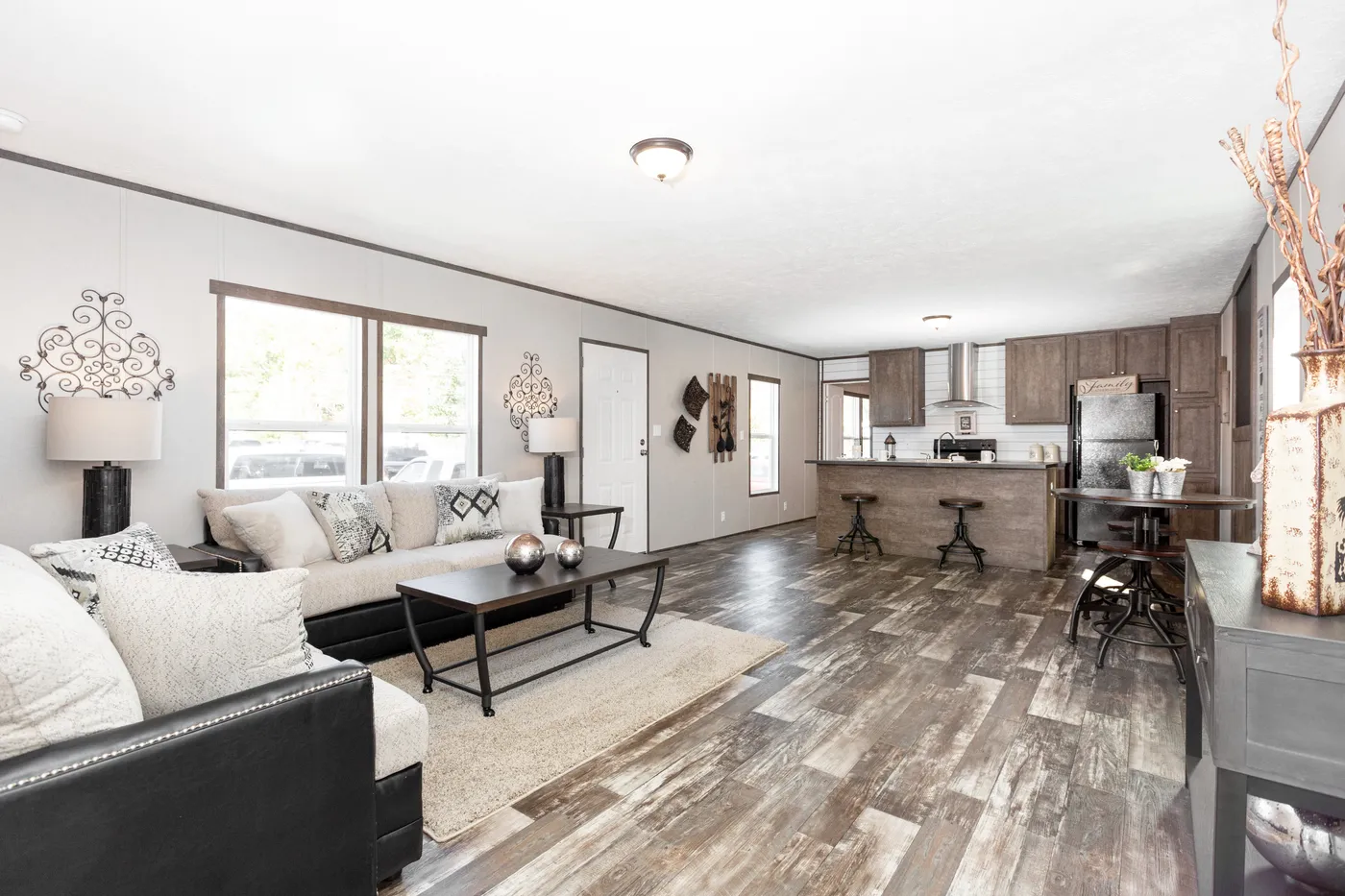 The THE BREEZE Living Room. This Manufactured Mobile Home features 3 bedrooms and 2 baths.