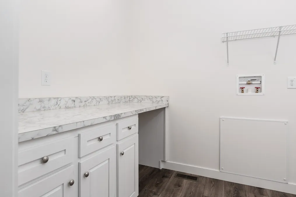 The 1439 CAROLINA "MAGNOLIA" Utility Room. This Manufactured Mobile Home features 3 bedrooms and 2 baths.
