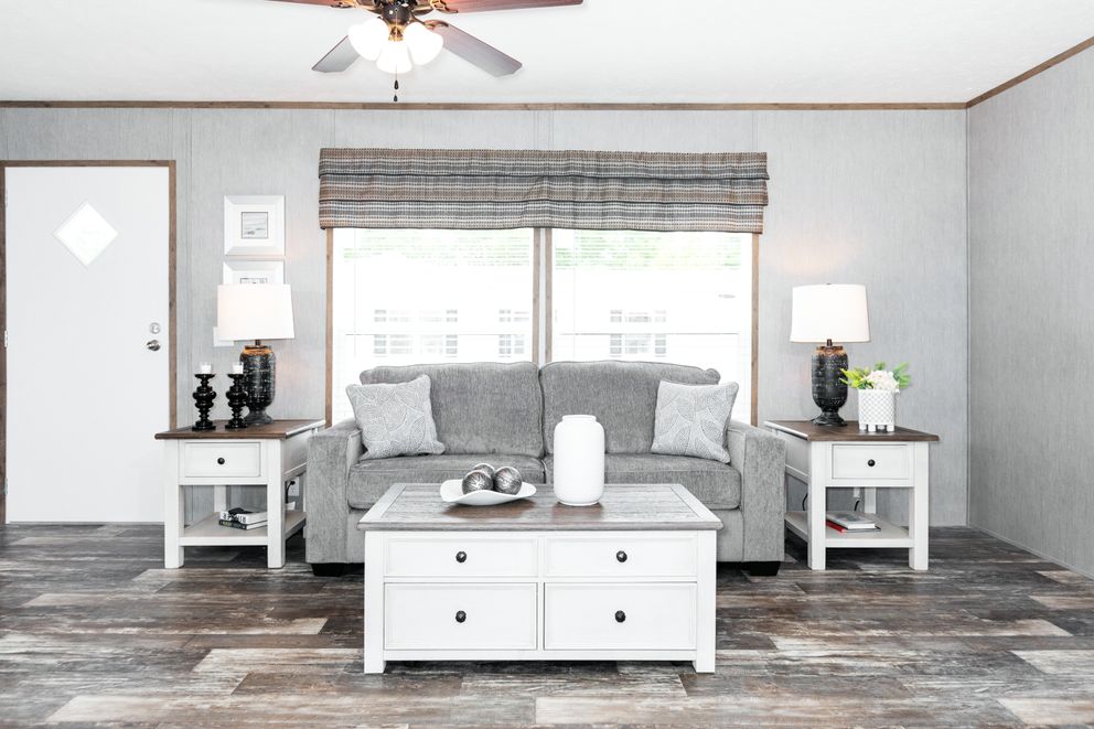 The THE MORRIS Living Room. This Manufactured Mobile Home features 3 bedrooms and 2 baths.