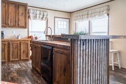 The THE CORNERBACK Kitchen. This Manufactured Mobile Home features 2 bedrooms and 1 bath.