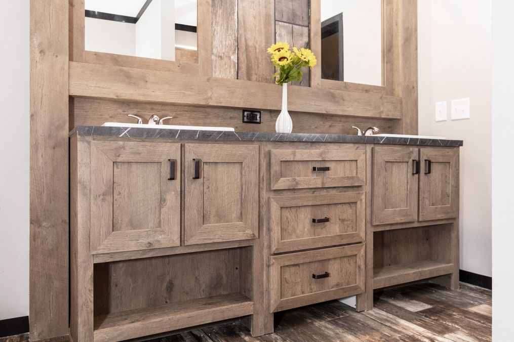 The BOUJEE Primary Bathroom. This Manufactured Mobile Home features 3 bedrooms and 2 baths.