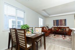 The FAIRPOINT 14602A Dining Area. This Manufactured Mobile Home features 2 bedrooms and 2 baths.