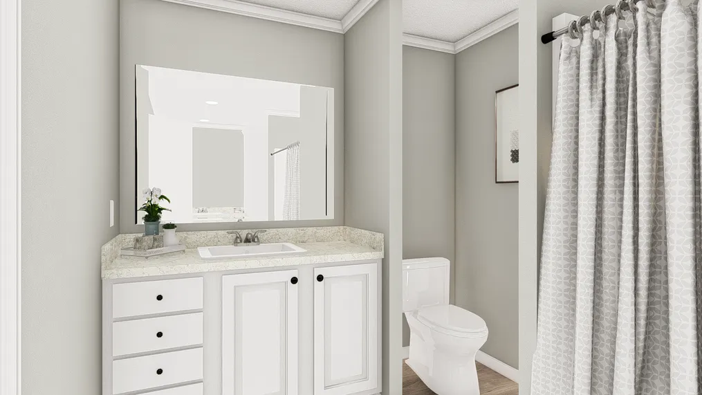 The 926 ADVANTAGE PLUS 7616 Primary Bathroom. This Manufactured Mobile Home features 3 bedrooms and 2 baths.