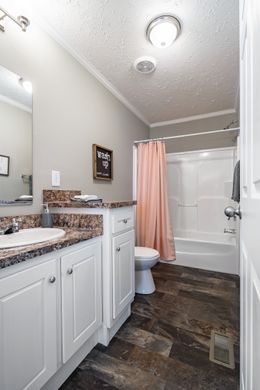 The 4607 ROCKETEER 7 7628 Guest Bathroom. This Manufactured Mobile Home features 4 bedrooms and 2 baths.