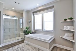 The EDGEWOOD Primary Bathroom. This Manufactured Mobile Home features 3 bedrooms and 2 baths.