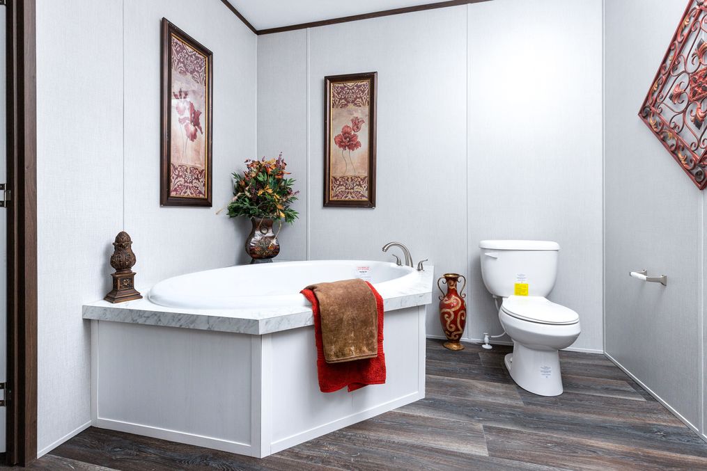 The THE CHOICE Primary Bathroom. This Manufactured Mobile Home features 4 bedrooms and 2 baths.