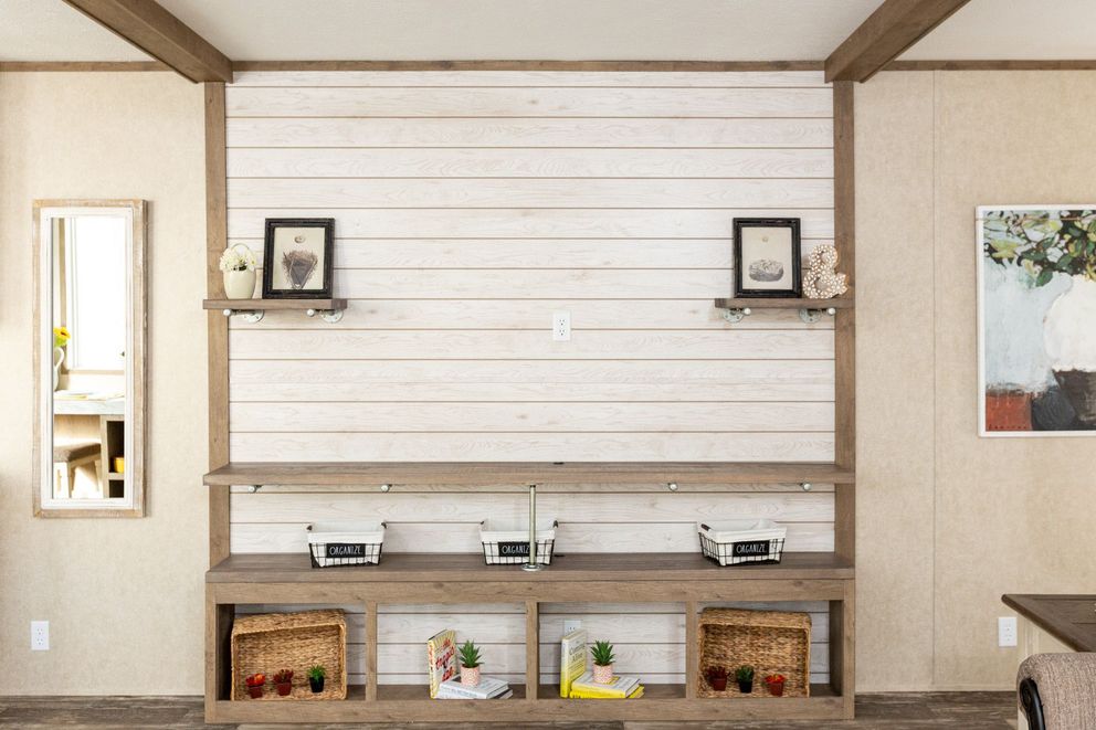 The THE RANCH HOUSE Living Room. This Manufactured Mobile Home features 3 bedrooms and 2 baths.