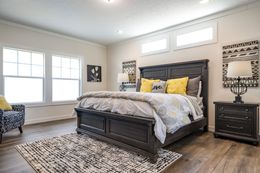 The 1434 CAROLINA "SOUTHERN BELLE" Master Bedroom. This Manufactured Mobile Home features 3 bedrooms and 2 baths.