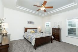 The 1714 HERITAGE Master Bedroom. This Manufactured Mobile Home features 3 bedrooms and 2 baths.