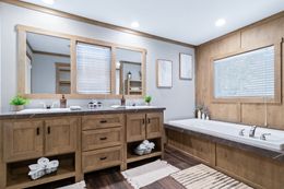 The FARMHOUSE 3 Guest Bathroom. This Manufactured Mobile Home features 3 bedrooms and 2 baths.