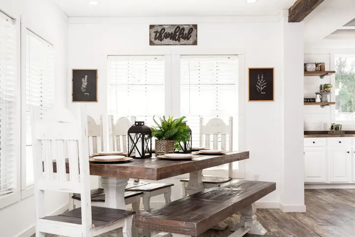 The THE LULABELLE Dining Area. This Manufactured Mobile Home features 4 bedrooms and 3 baths.