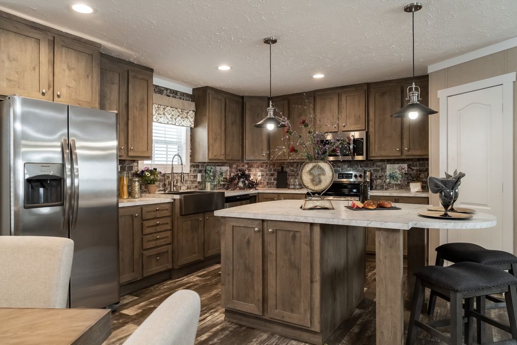 The ELITE COMMANDER 32X76 4 BR Kitchen. This Manufactured Mobile Home features 4 bedrooms and 2 baths.